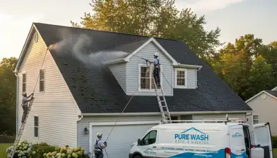 Professional roof cleaning service in Shreveport, LA by Next Level Exteriors removing moss and debris